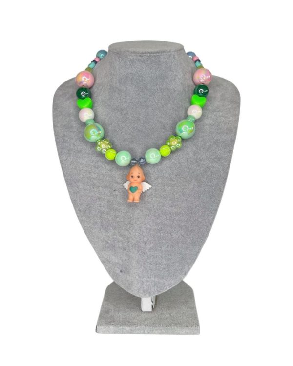 Kewpie baby doll necklace by Diana Rikasari
