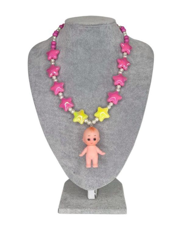 Kewpie baby doll necklace by Diana Rikasari