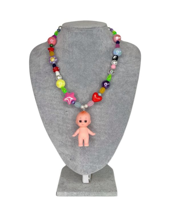 Kewpie baby doll necklace by Diana Rikasari